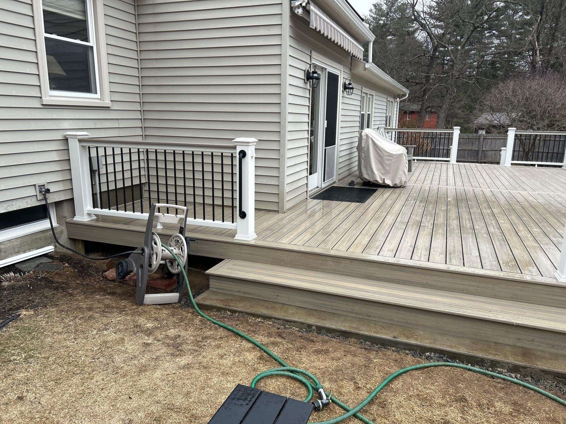 Central Connecticut home with a rear deck and yard